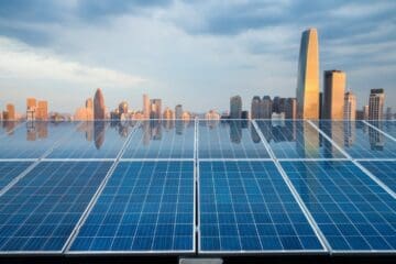 Rooftop solar panels city reflection